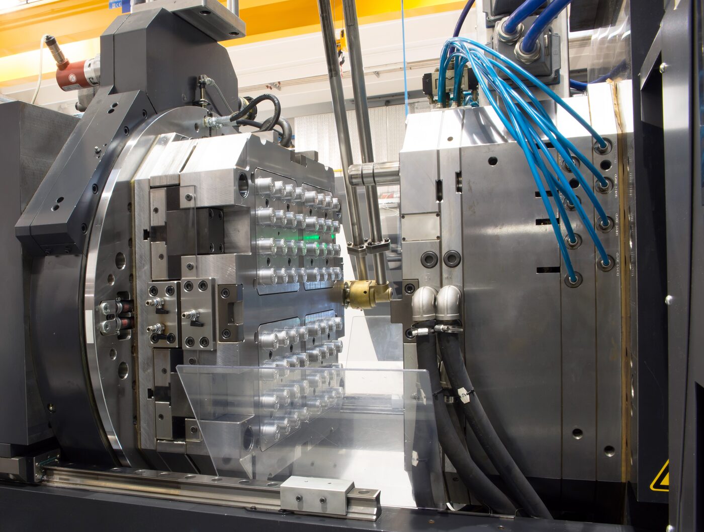 Injection mold in machine cavity